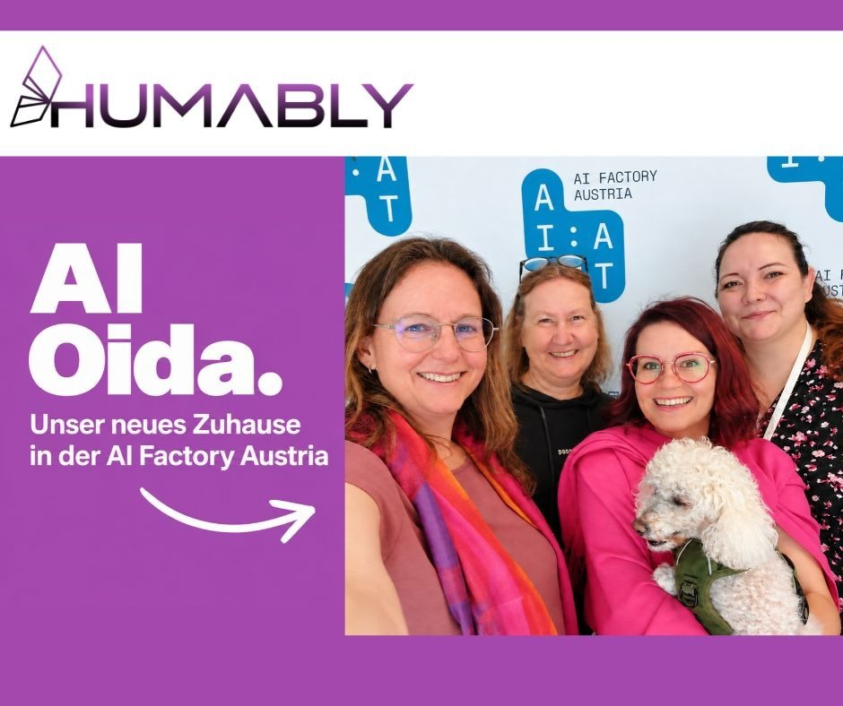 Vier lächelnde Frauen des HUMABLY-Teams vor der Kulisse der AI Factory Austria. Links steht der Text „AI Oida. Unser neues Zuhause in der AI Factory Austria“.